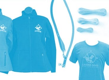 Blue image of Leader Dog gift shop items including two light jackets with Leader Dog logo, a leather leash, several sizes of chew toy, and a t-shirt with Leader Dog logo