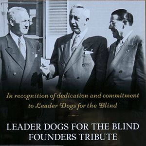 A plaque with a picture featuring Leader Dogs for the Blind founders and the words, "In recognition of dedication and commitment to Leader Dogs for the Blind, Leader Dogs for the Blind Founders Tribute"