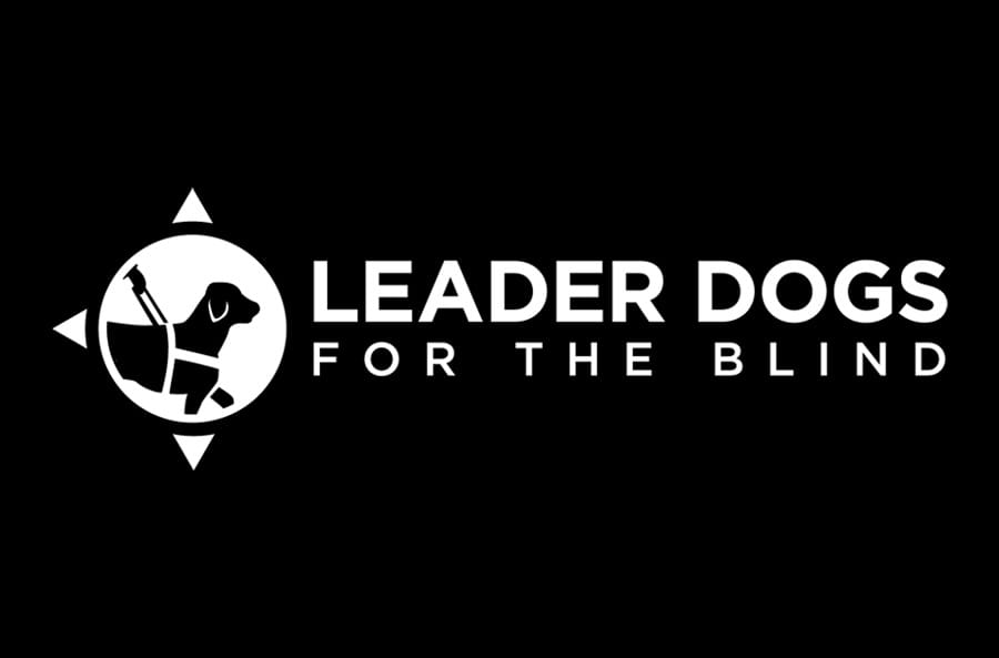 White Leader Dog logo on a solid black background