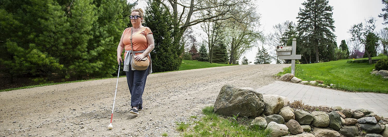 orientation and mobility Client Vikki M gravel road trees