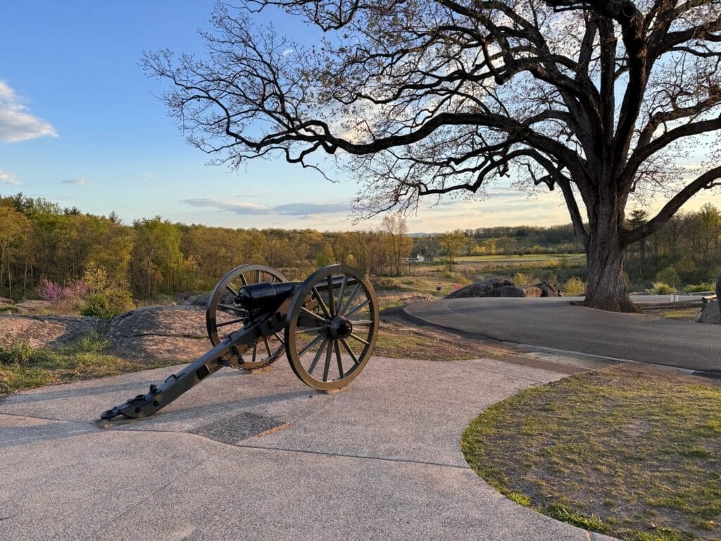A Civil War era canon in a field at Gettysburg National Park