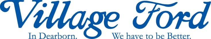 Village Ford Logo 2 Line Blue Village Ford logo in blue cursive text. Below it says "in Dearborn" and "we have to be better"